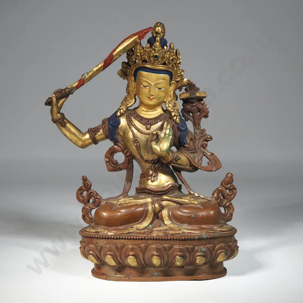 Brass Figure Of Manjushri, the Bodhisattva Of Wisdom In Mahayana  Buddhism.  Image 1++