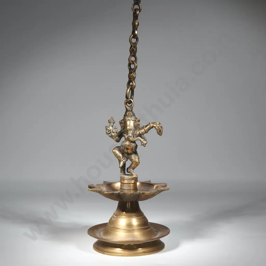 Brass Hanging Oil Lamp Known as A Diya Featuring The Hindu Deity Ganesha. Commonly Used at Religious Festivals Image 1++