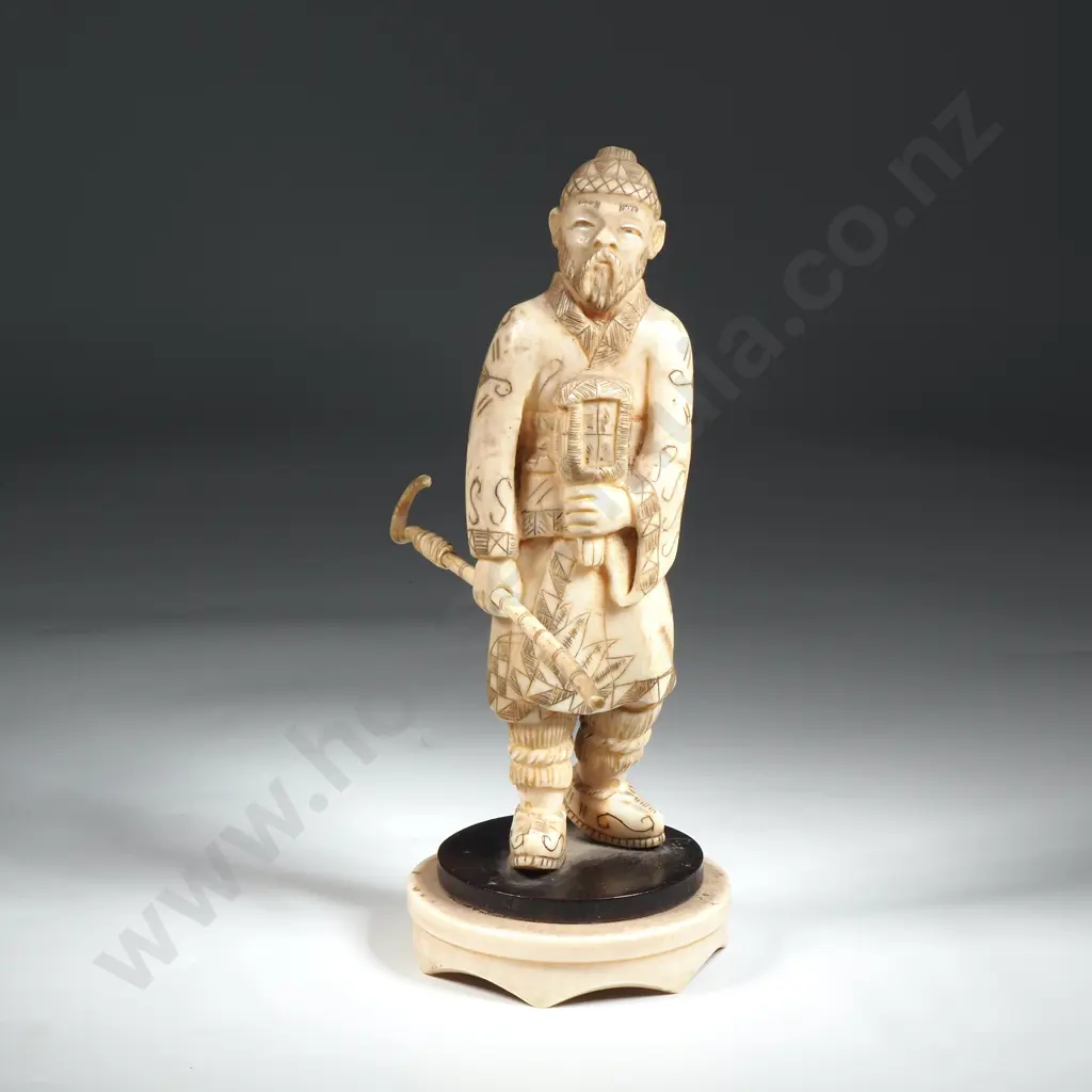 Ivory Okimono Of An Old Man Holding A Staff.  Image 1++