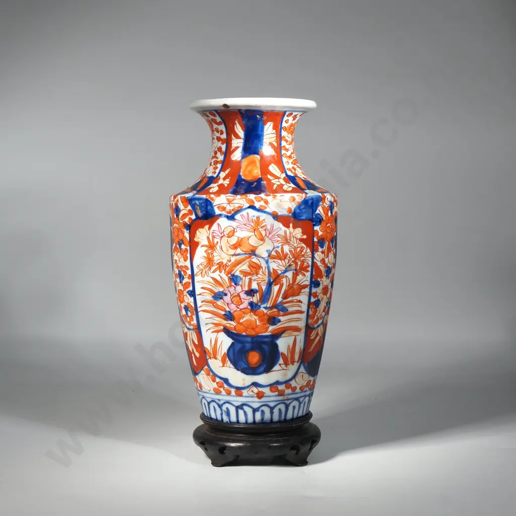 Japanese Imari Vase In Traditonal Iron Red & Underglaze Blues & Decorated With Panels Of Flowers In A Vase.  Image 1++