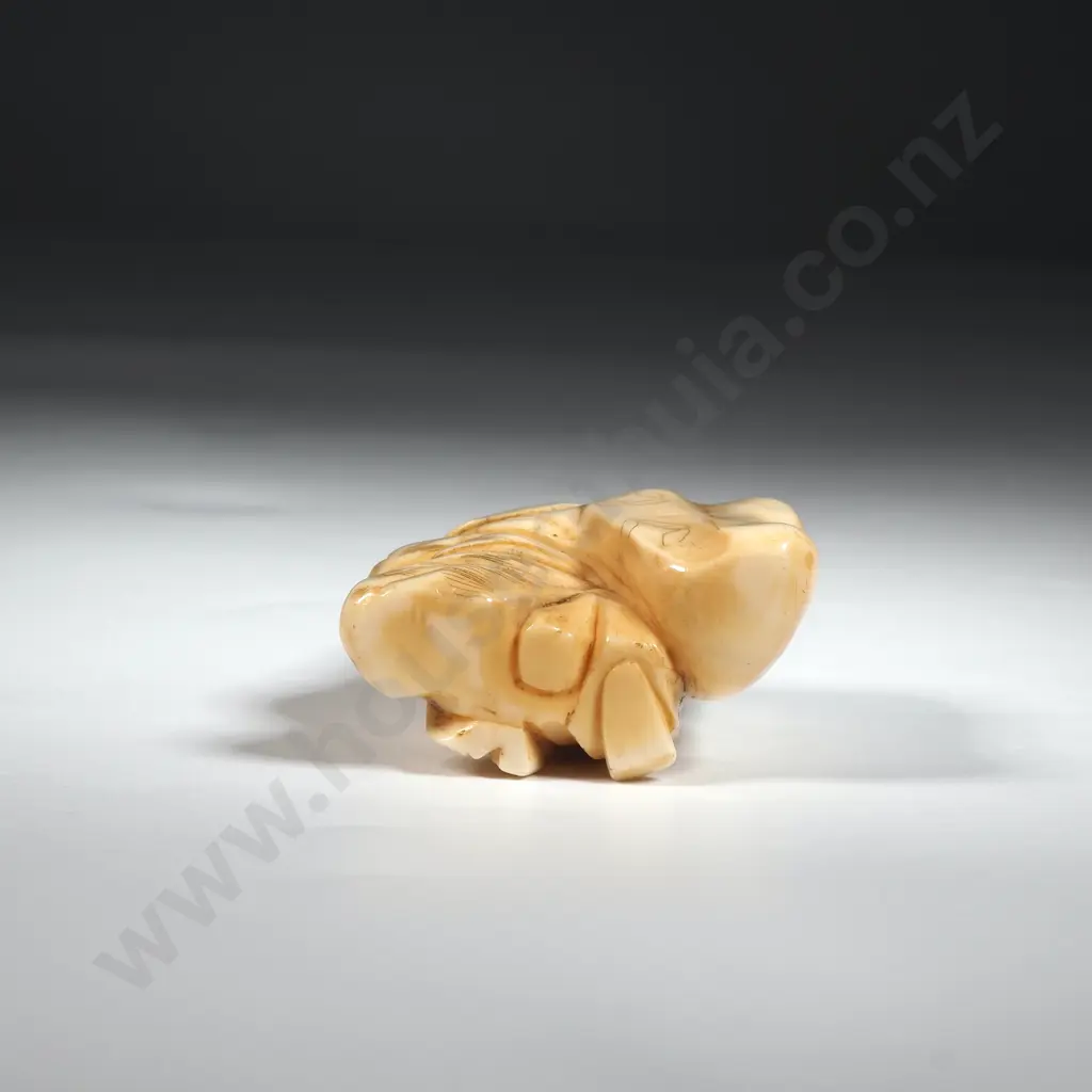 Ivory Okimono Depicting a Man with Sack & Holding a Rod Image 1++