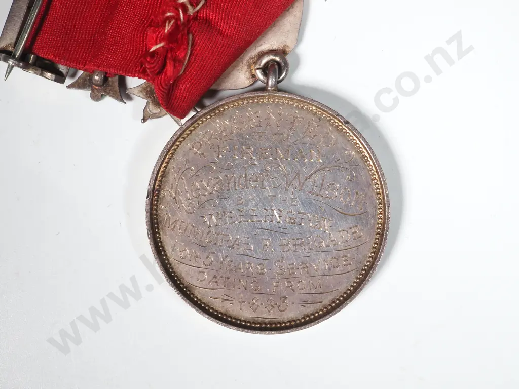 1883 UFBA Medal to Alexander Wilson - Wellington Municipal Fire Brigade - 51.47 Grams  Image 1++