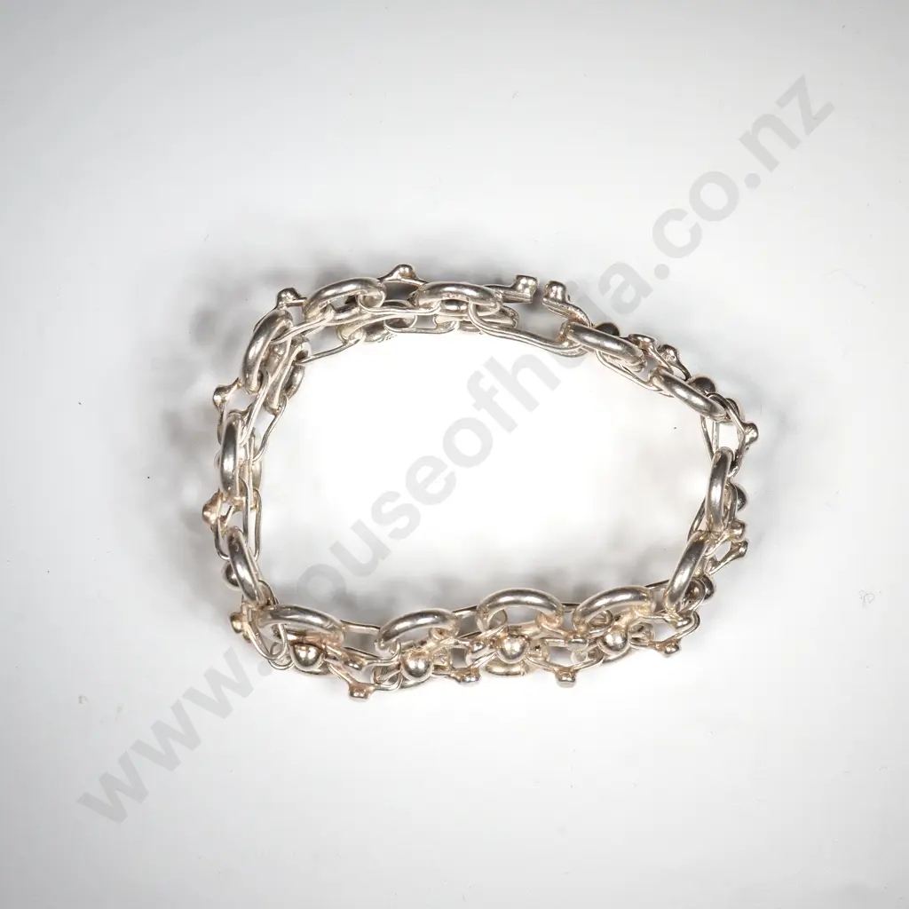Sterling Silver Bracelet w Interlocking Figures of Elephants Image 1++