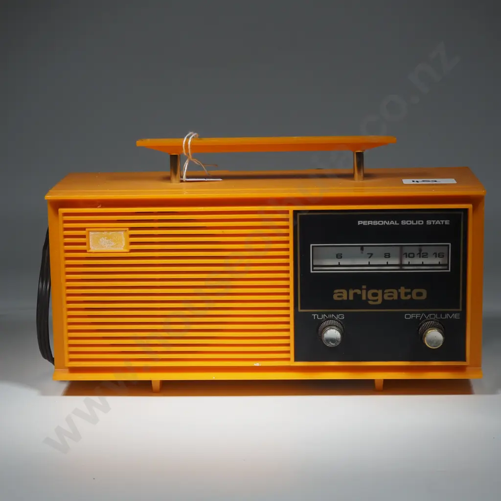 Arigato Personal Solid State AM Radio in Bright Orange With A Black Faceplate Image 1++