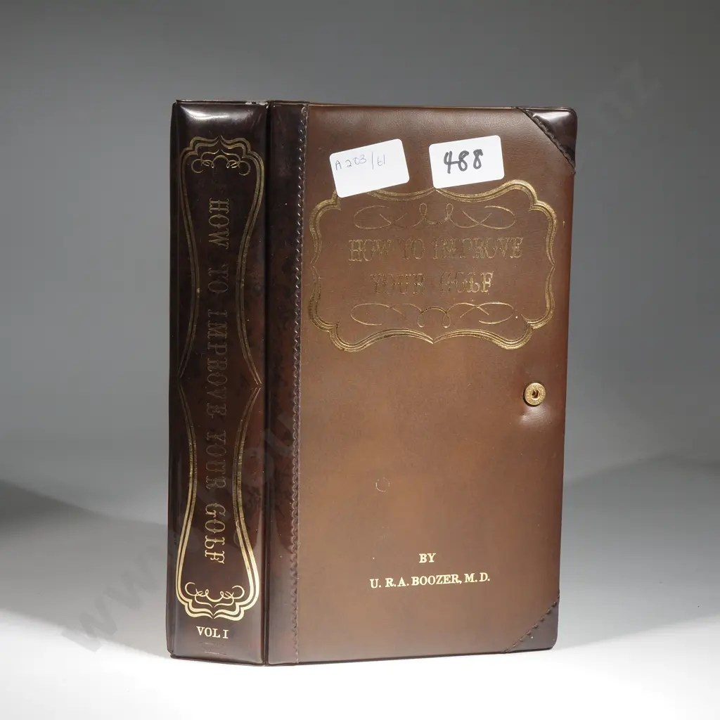 Flask & Glasses In The Form Of A Book Titled " How to Improve Your Golf" By U.R.A Boozer Image 1++