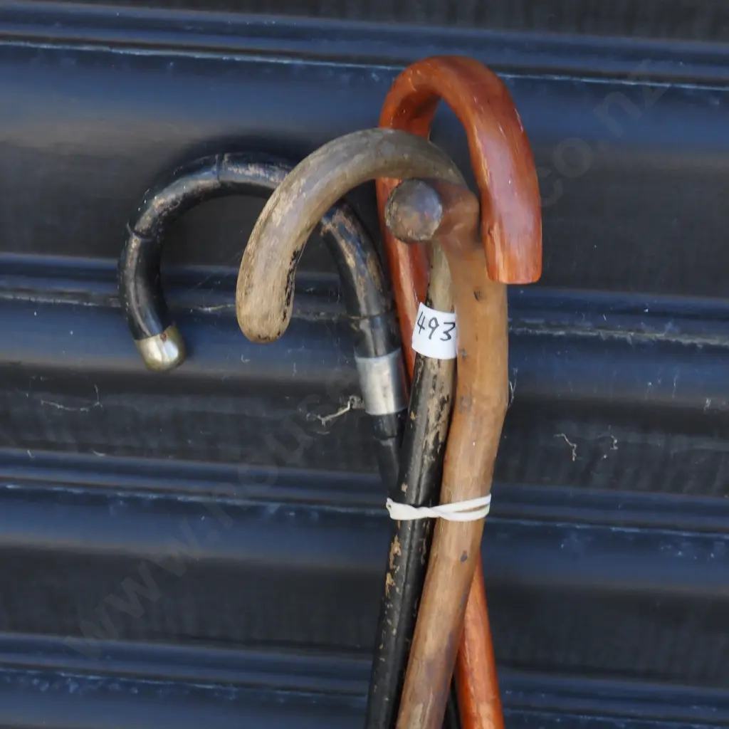 Four Antique Walking Sticks.  Image 1++