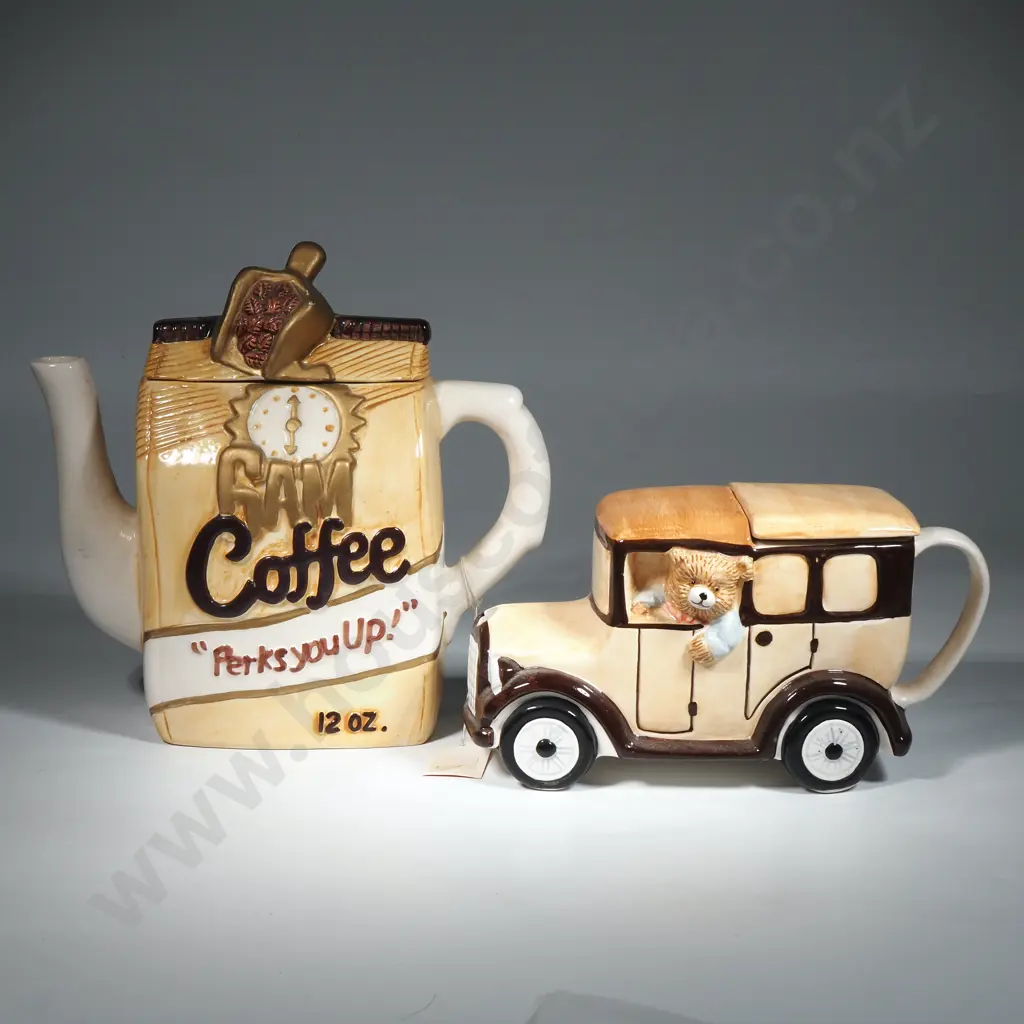 A Pair of Large Novelty Teapots Image 1++