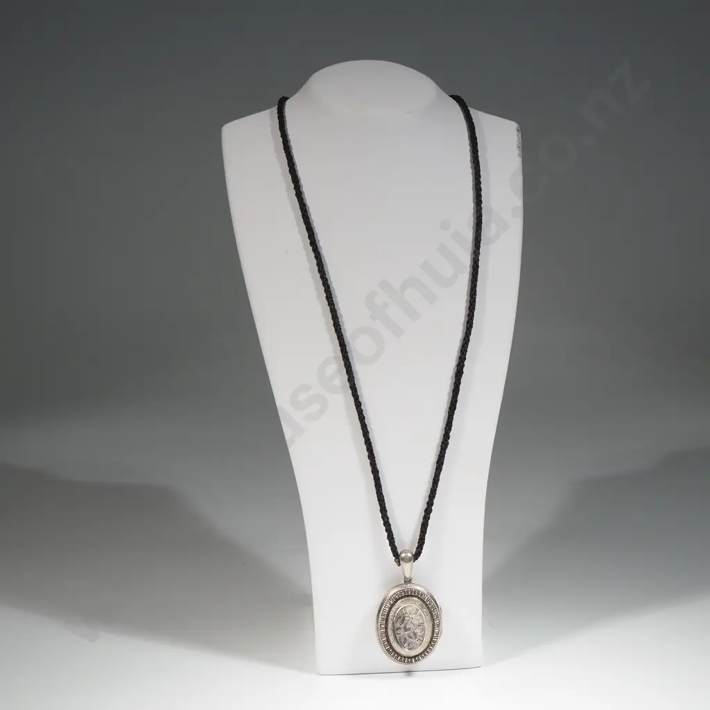 Victorian Sterling Silver Locket with Allover Leaf Pattern To Centre On A Plaited Hair Cord Image 1++