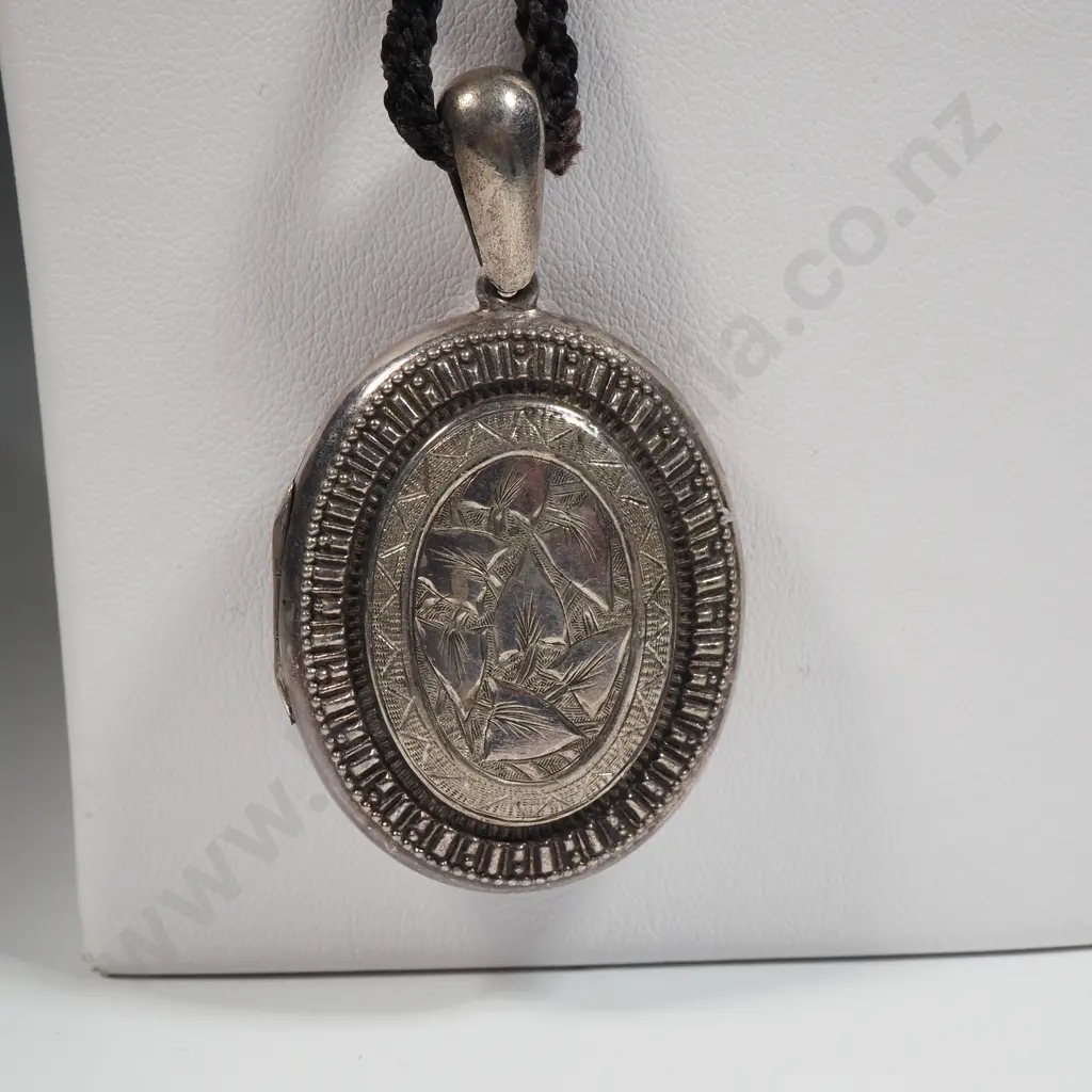 Victorian Sterling Silver Locket with Allover Leaf Pattern To Centre On A Plaited Hair Cord Image 1++