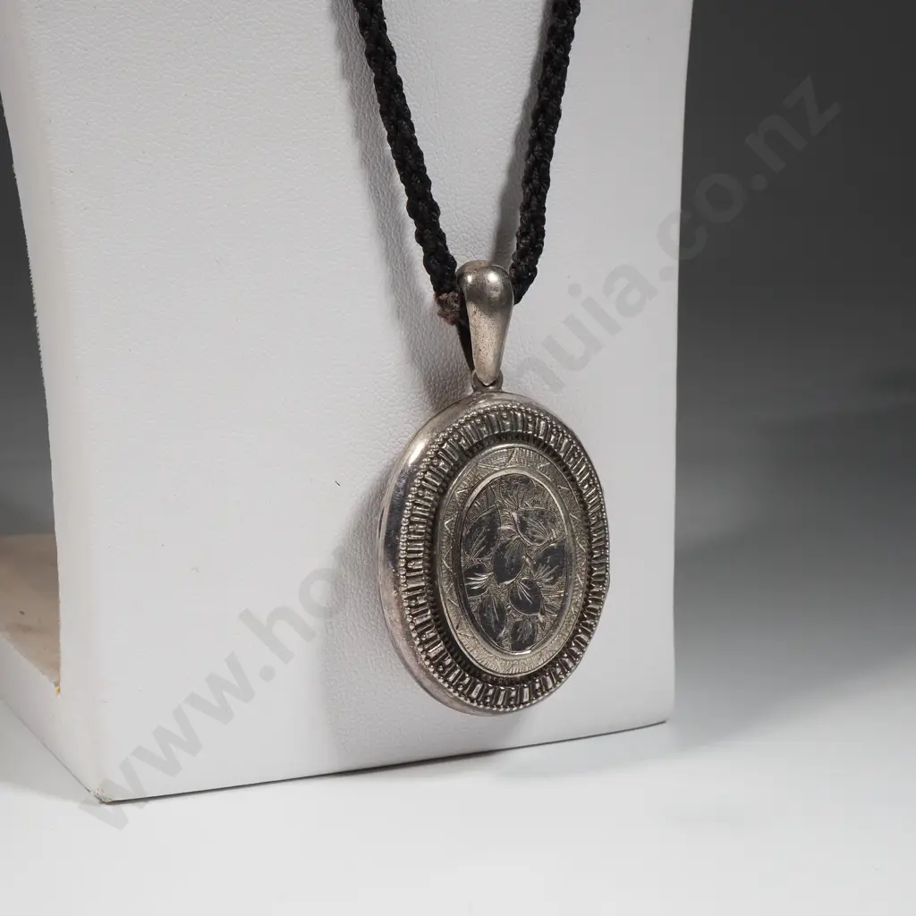 Victorian Sterling Silver Locket with Allover Leaf Pattern To Centre On A Plaited Hair Cord Image 1++