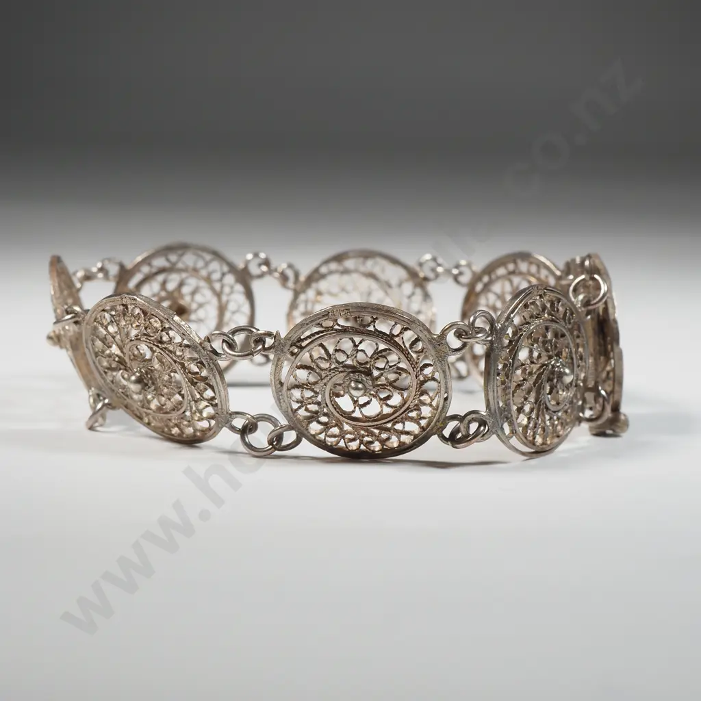 Sterling Silver Sectional Bracelet Comprised of Circular Filigree Medallions. Image 1++