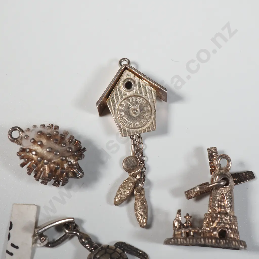 Four Vintage Sterling Silver Charms Including A Hedgehog, Cuckoo Clock, Windmill & Turtle Image 1++