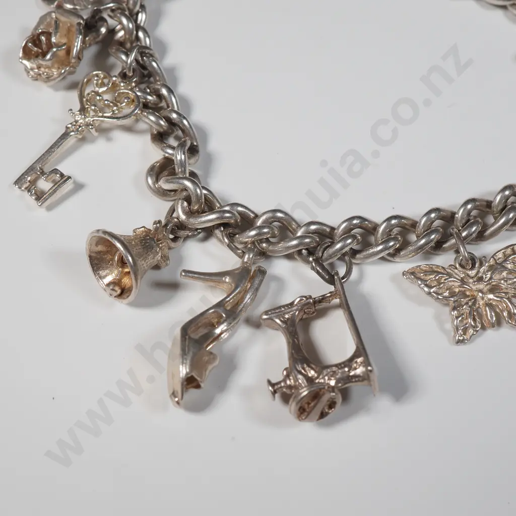 Vintage Sterling Silver Charm Bracelet with A Variety Of Charms Including A Sewing Machine, Spider's Web,Engagement Ring Image 1++