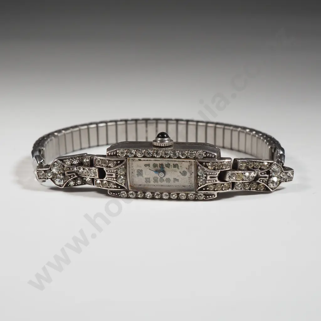 Sterling Silver Wrist Watch w Costume Gems on Elasticised Strap. Image 1++