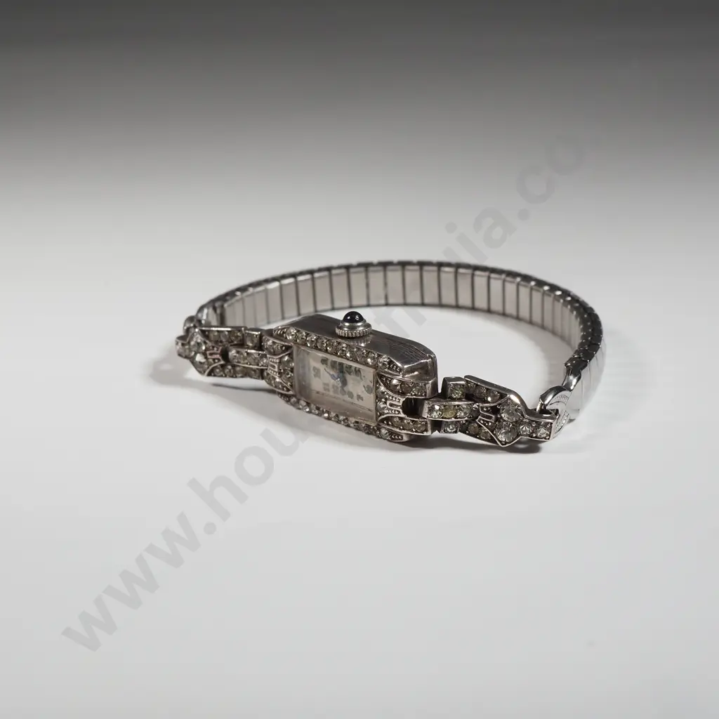 Sterling Silver Wrist Watch w Costume Gems on Elasticised Strap. Image 1++