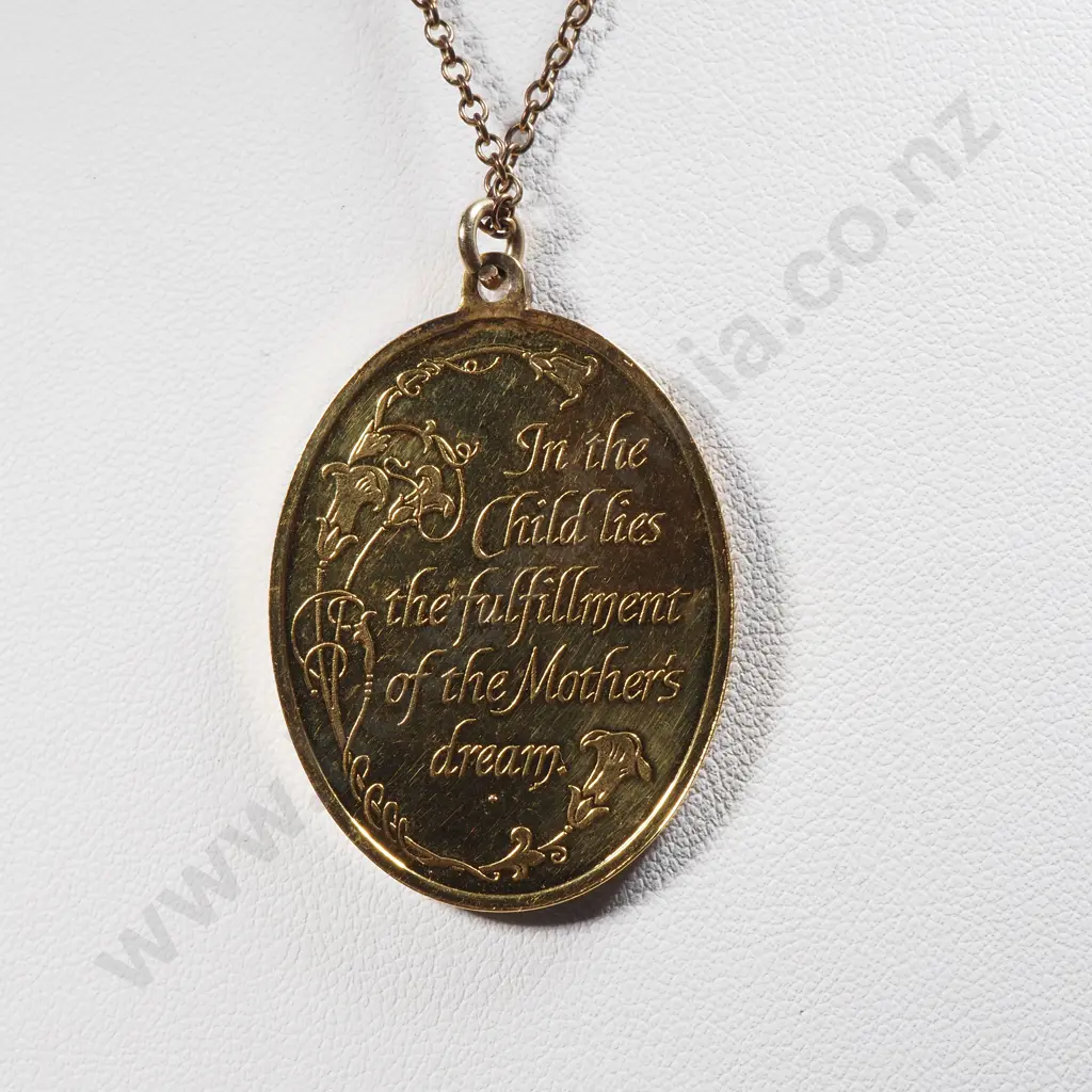 Gold Plated Sterling Silver Oval Pendant With Embossed Detail Of A Praying Child Image 1++