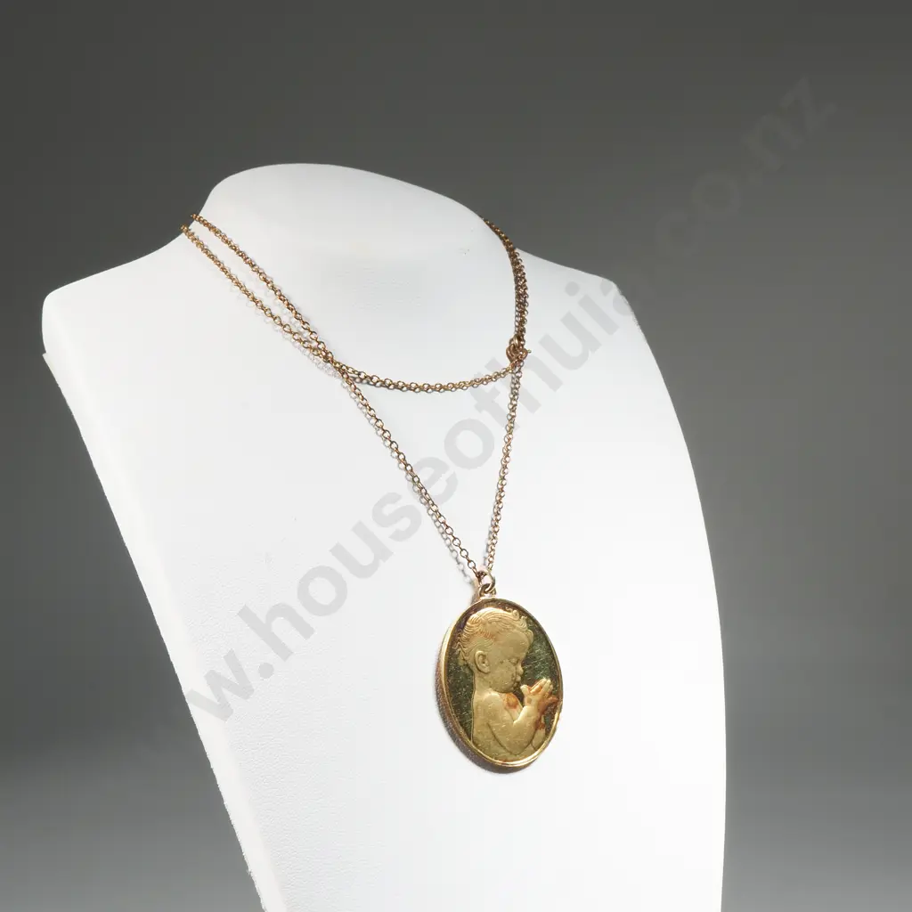 Gold Plated Sterling Silver Oval Pendant With Embossed Detail Of A Praying Child Image 1++