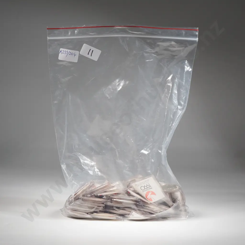 Fifty New Zealand UNC Dollar Coins - Commonwealth Games Slips Image 1++