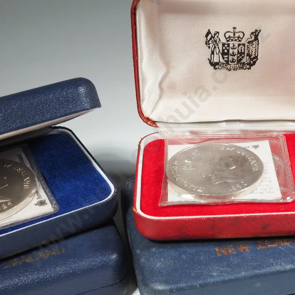 Four UNC 1974 Commonwealth Games One Dollar Coins in Unrelated Coin Cases  Image 1++