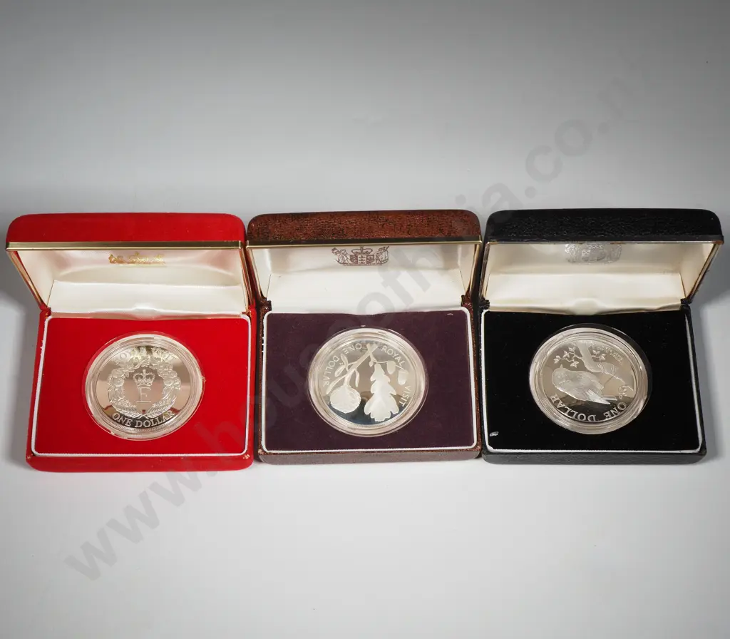 Three New Zealand Cased Silver Proof Dollar Coins	 Image 1++