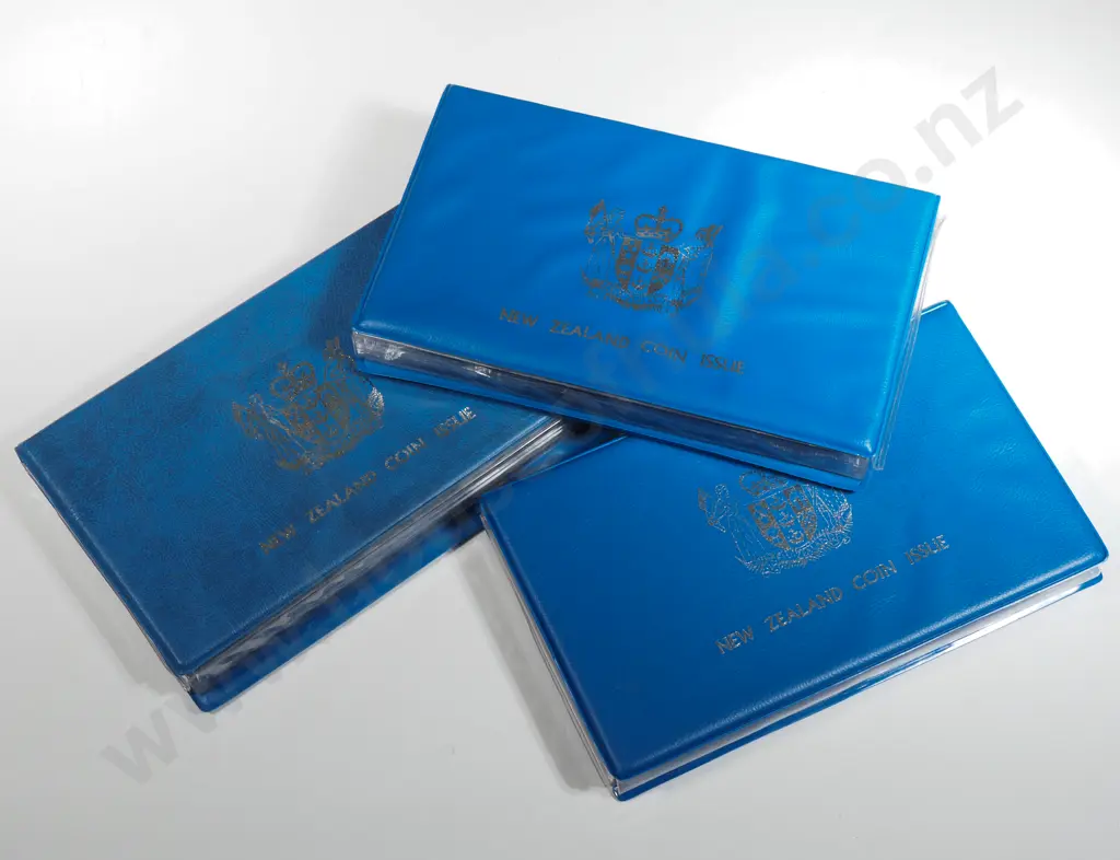 Three New Zealand Proof Coin Sets w Silver Dollars	 Image 1++