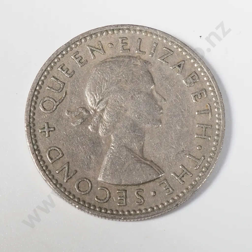 Two 1962 New Zealand Shillings - No Ground Line & 1965 Broke Back Shilling  Image 1++