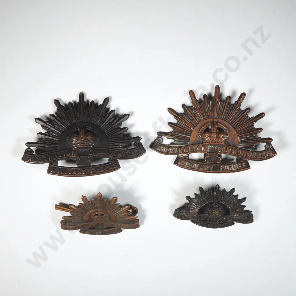 Four Australian Rising Sun Cap & Collar Badges. Image 1++