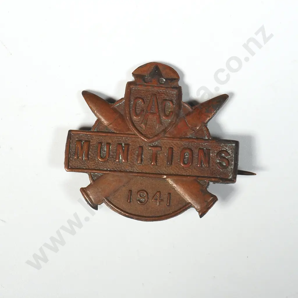 CAC Munitions 1941 Lapel Badge. Image 1++