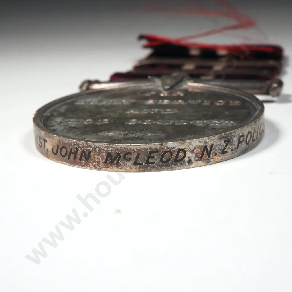 New Zealand Police Long Service & Good Conduct Medal to 775 John McLeod - White Maker Image 1++