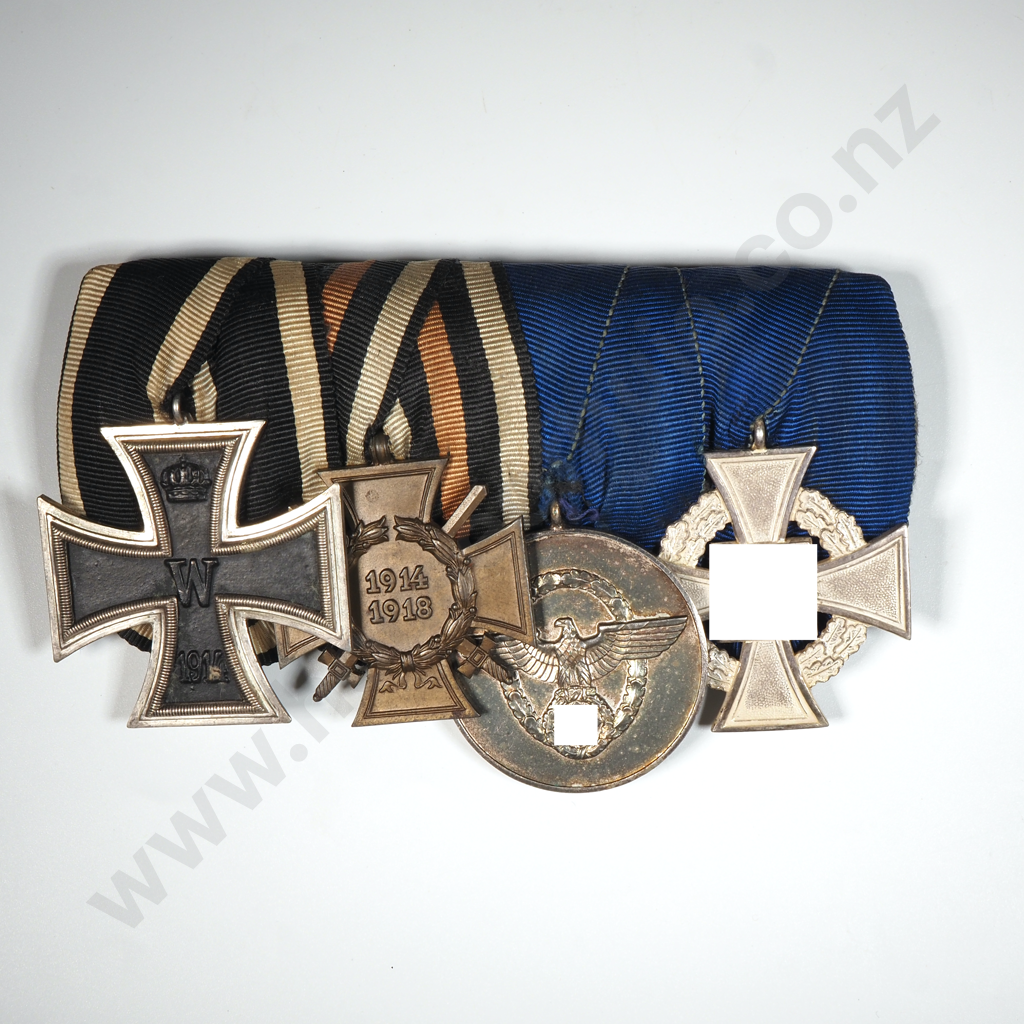 Four WWI and WWII German Medals Image 1++