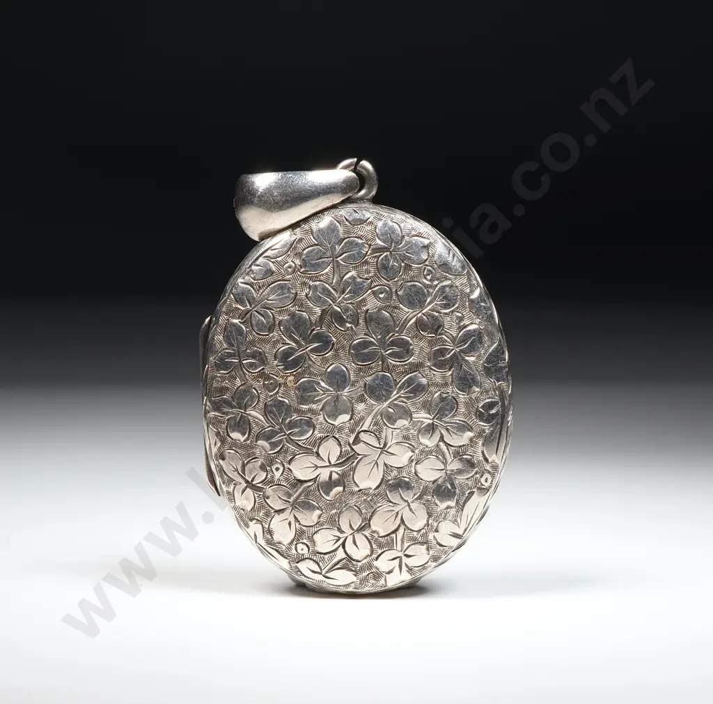 Antique Sterling Silver Oval Locket with Foliate Decoration Image 1++