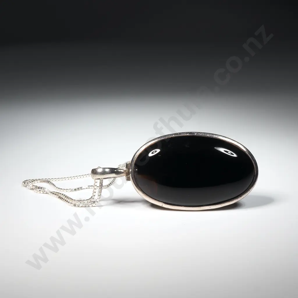 Sterling Silver Chain & Black/Tortoise Shell Toned Pendent. Image 1++