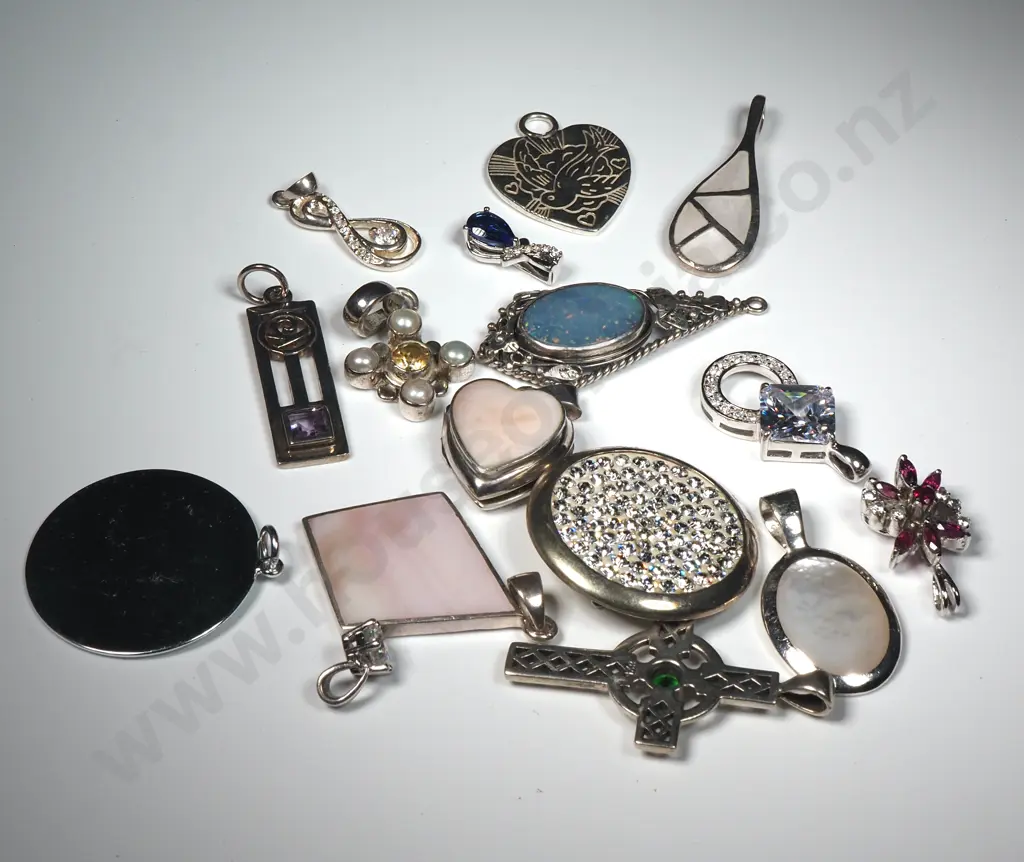Assorted Lot of Fifteen Sterling Silver Pendants. Image 1++