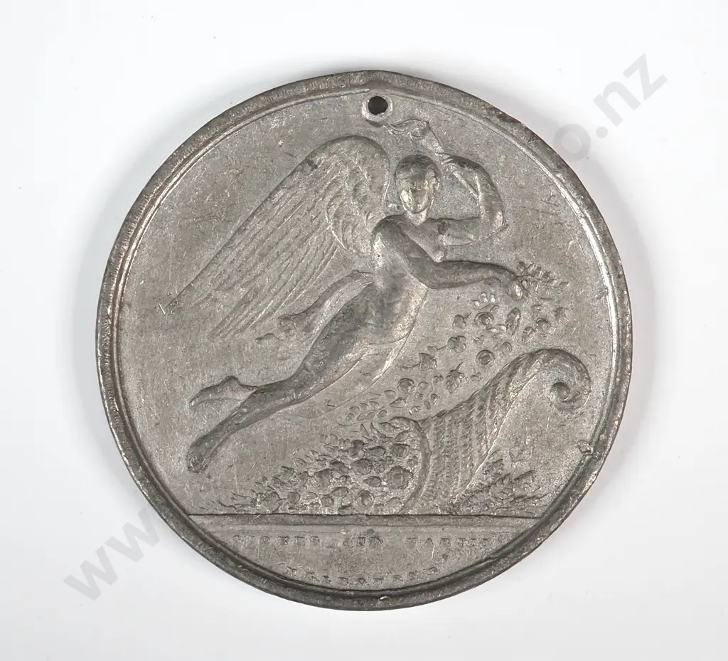 White metal medal struck for the Industrial Exhibition held in Christchurch in 1882. 38.5mm. It is listed in the Medallic Commemoratives of New Zealand 1865-1940 by Leon Morel as number 1882/21 Image 1++