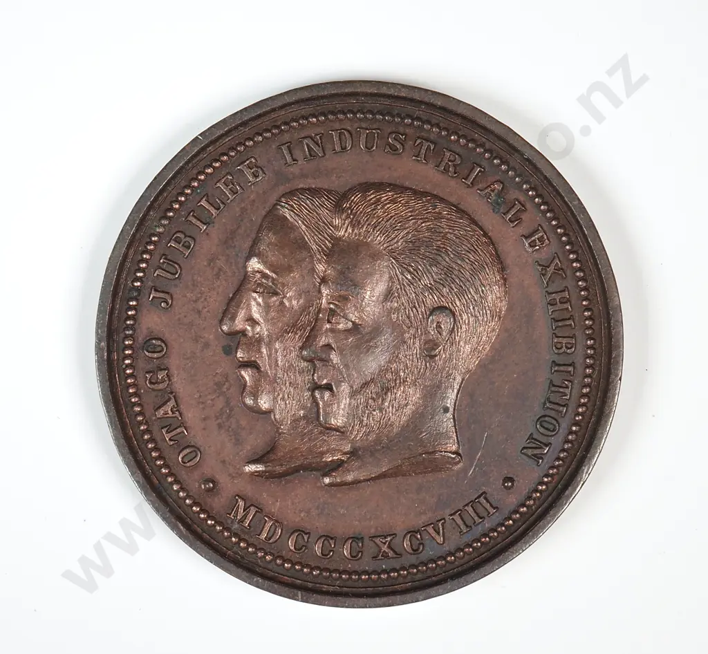 Bronze medal struck for the Otago Jubilee Exhibition held in Dunedin in 1898. 38mm. It is listed in the Medallic Commemoratives of New Zealand 1865-1940 by Leon Morel as number 1898/5 and has a rarity rating of R6 very rare ( estimated 4 to 10 known ) Image 1++
