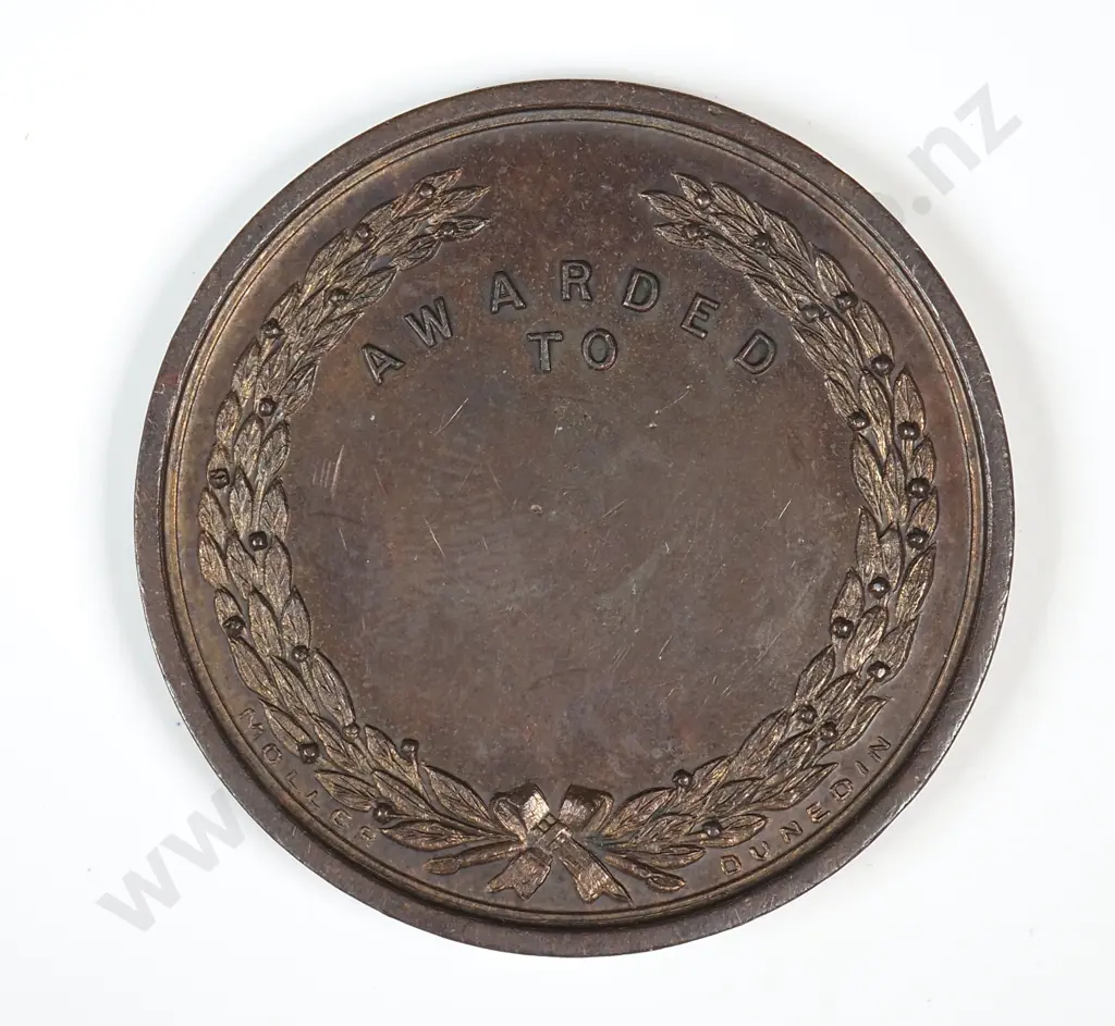 Bronze medal struck for the Otago Jubilee Exhibition held in Dunedin in 1898. 38mm. It is listed in the Medallic Commemoratives of New Zealand 1865-1940 by Leon Morel as number 1898/5 and has a rarity rating of R6 very rare ( estimated 4 to 10 known ) Image 1++