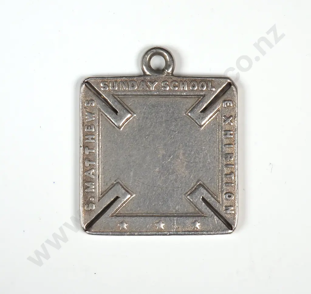 Silver medal struck for the St. Matthew’s Sunday School Exhibition, Auckland, C.1876. 21mm x 21mm. By Anton Teutenberg. Very rare Image 1++