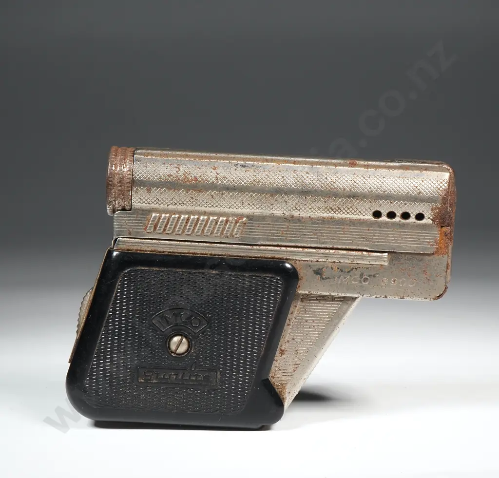 Small Gun-Shaped Cigarette Lighter Image 1++