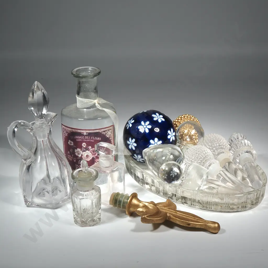 Quantity Of Glass Items Including Two Small Glass Bottles,Collection of Bottle Stoppers, Oval Glass Tray, & Sauce Bottle Image 1++
