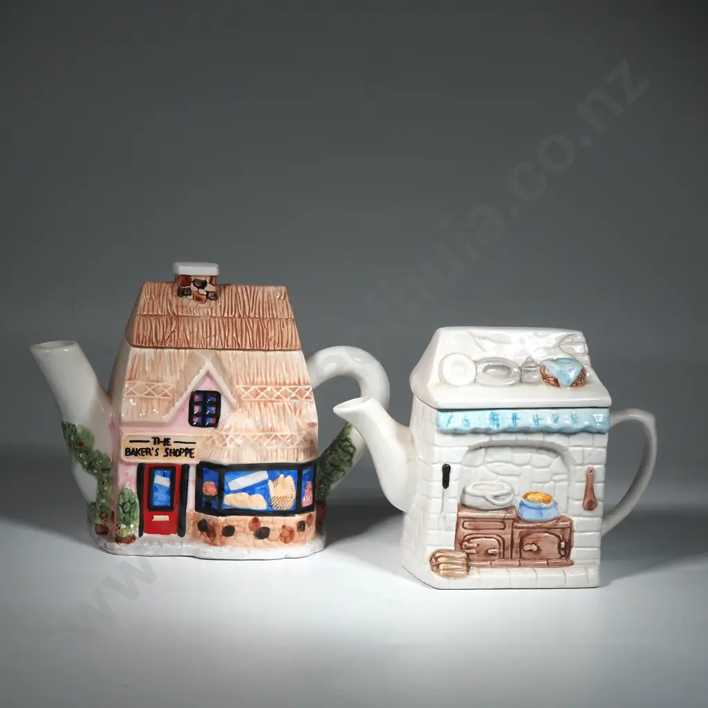 A Pair of Large Novelty Teapots Image 1++