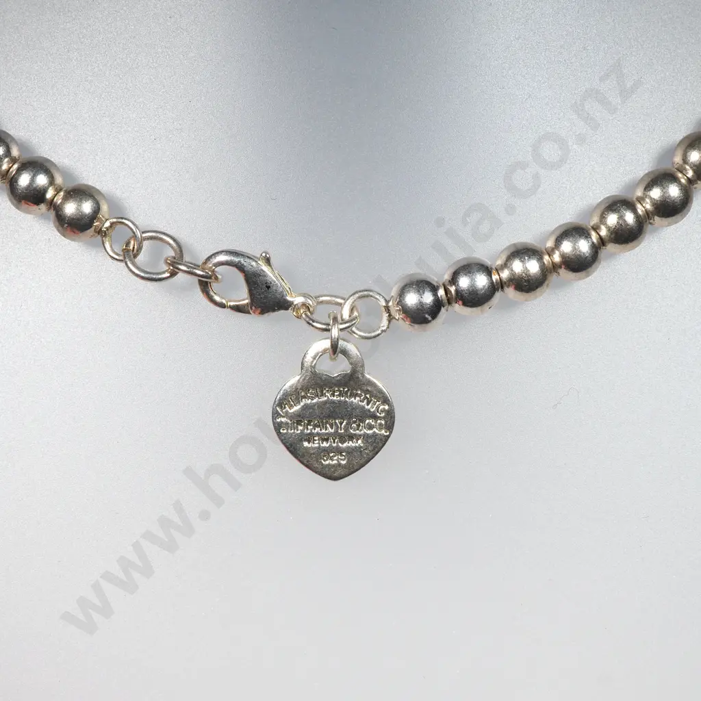 Silver Coloured 'Return to Tiffany & CC. 9(?)25' Heart Tag on Bead Necklace. Image 1++