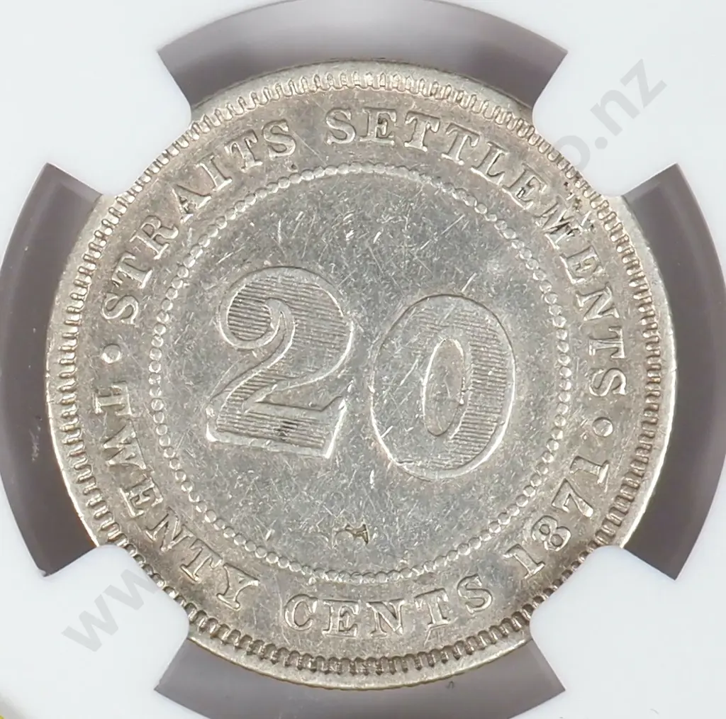 Straits Settlements 1871 Twenty Cents, Slabbed And Graded By Ngc As "xf Details = Chopmarked". There Is One Chinese Chopmark On The Reverse. Catalogue Vale Of Usd $1300 ( Nzd $2166 ) In Very Fine And Usd $3000 ( Nzd $5000 ) In Extremely Fine Image 1++
