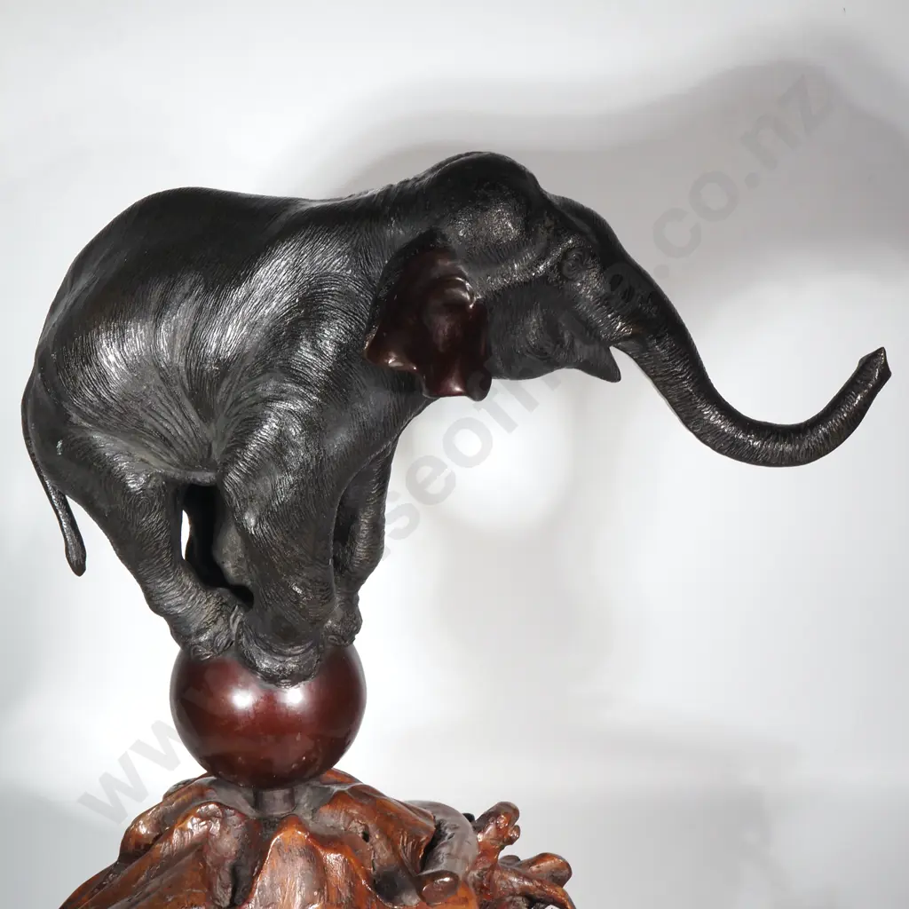 Magnificent Bronze Elephant Standing on Globe & Carved Naturalistic Wood Base Image 1++