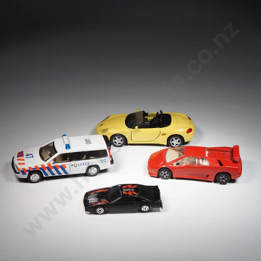 Four Toy Cars - Volvo Police Car, Burago Lamborghini Diablo, Maisto Porsche Boxter & a Black Pontiac Image 1++