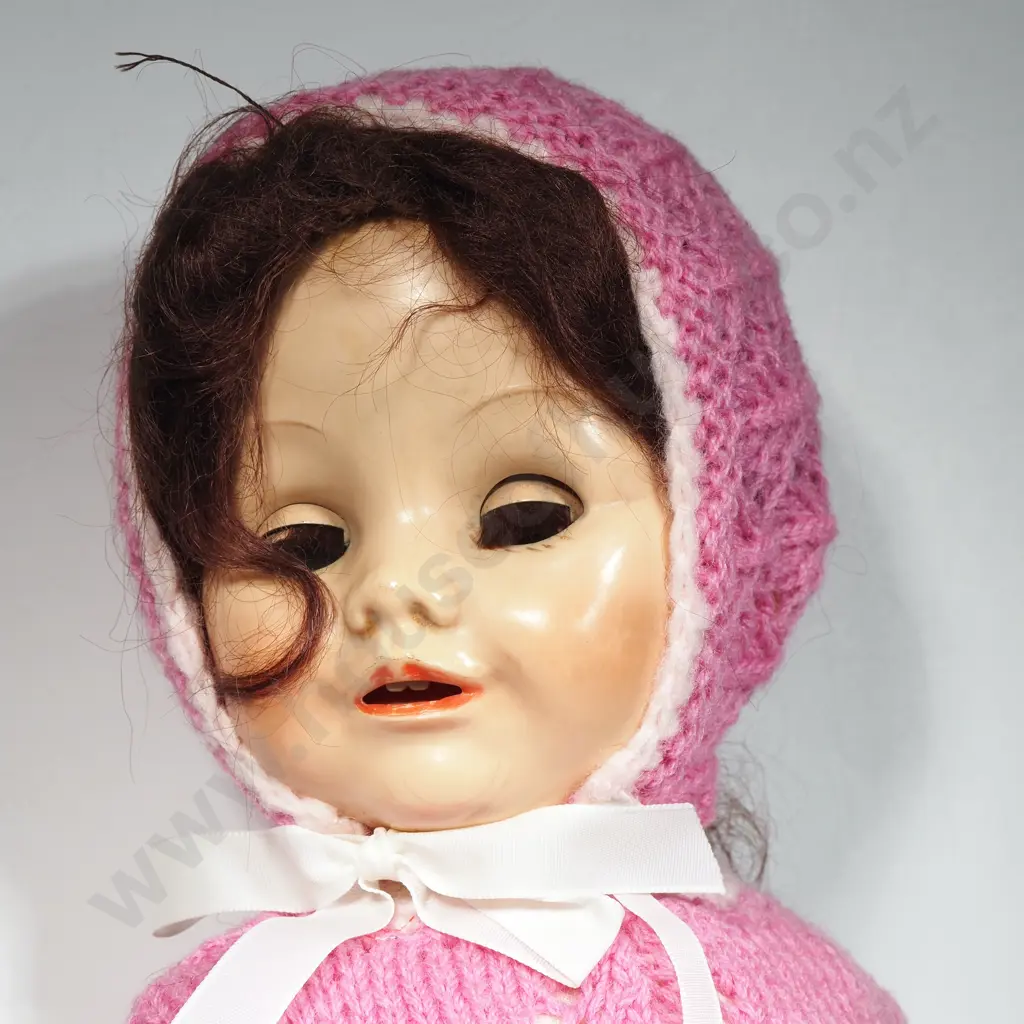 Vintage Porcelain Doll Featuring Pink Knitted Garments Including Booties & Bonnet Image 1++