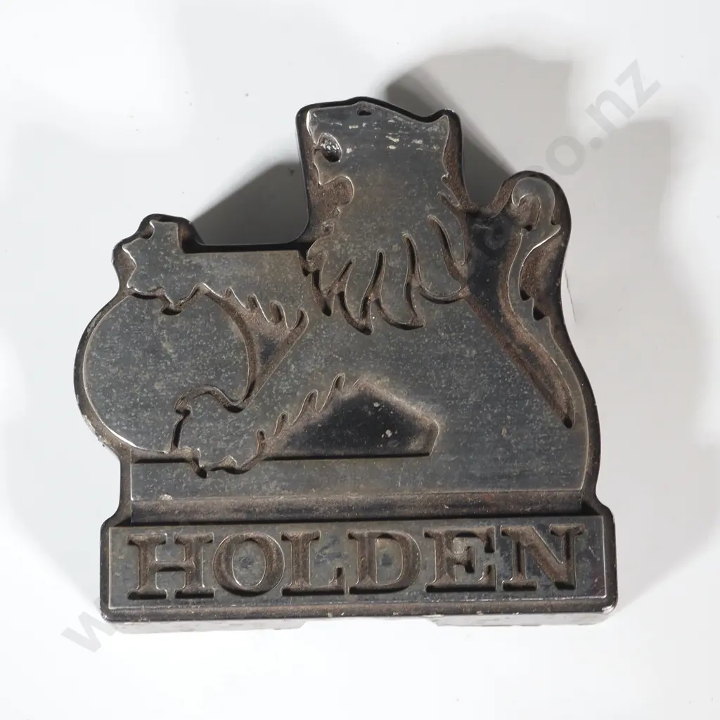 Holden HX Grille Badge Featuring The Iconic Holden Lion Above The Holden Lettering Image 1++