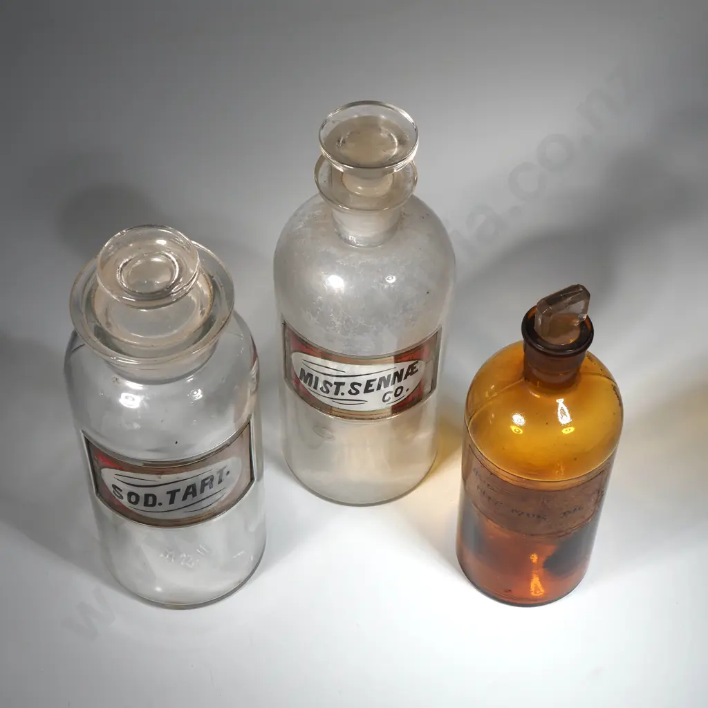 Three Glass  Antique Chemist Jars -"Sod. Tart", "Mis .Sennae Co." & "Sod.Tart" & An Amber Glass Chemist Jar Image 1++