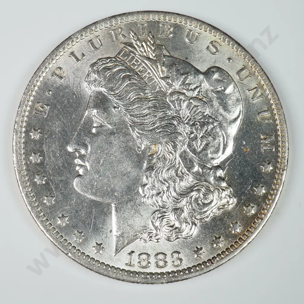 Morgan Dollar: 1883 O - MS60 C.V USD $116 ( NZD $200 ) MS65 C.V USD $324 ( NZD $560 ) Image 1++