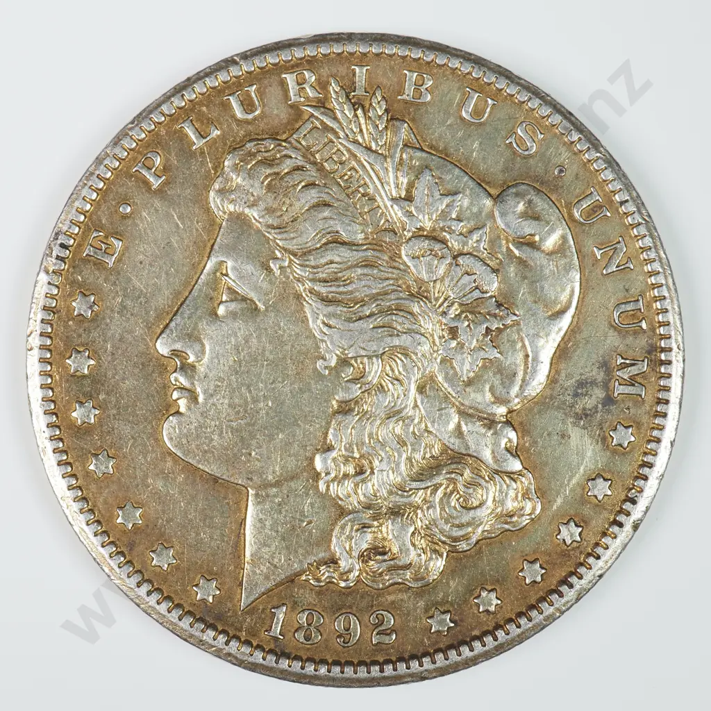 Morgan Dollar: 1892 CC - Gilded, Mount Marks On Reverse, Else Extremely Fine Details. Image 1++
