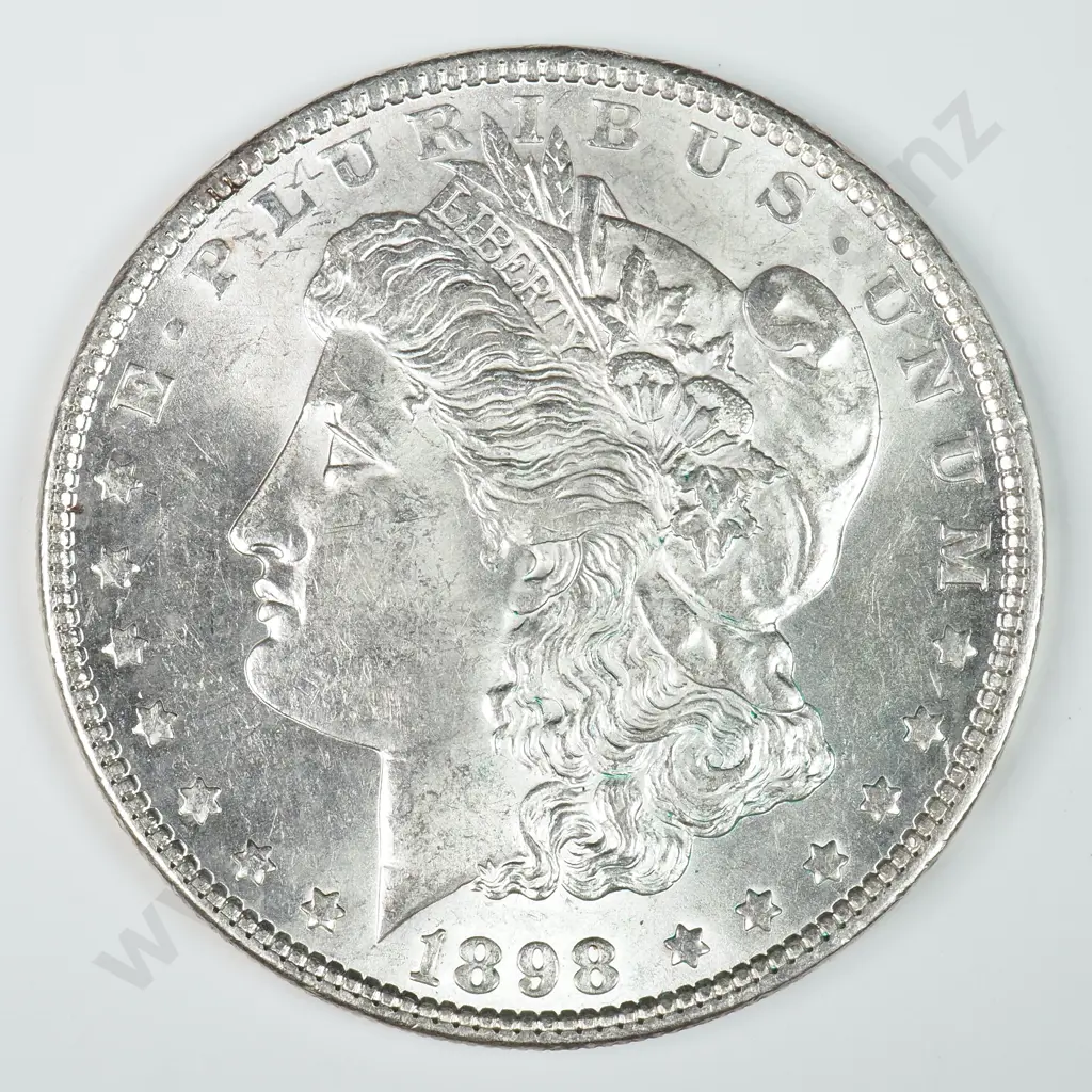 Morgan Dollar: 1898 - MS60 C.V USD $116 ( NZD $200 ) MS65 C.V USD $356 ( NZD $620 ) Image 1++